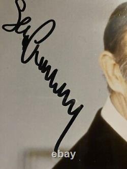 An 8 x 10 color publicity photo sign by Sean Connery from a James Bond film