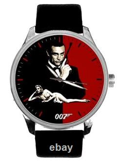 VINTAGE 1970s SEAN CONNERY AS 007 JAMES BOND RED & BLACK DIAL SOLID BRASS WATCH